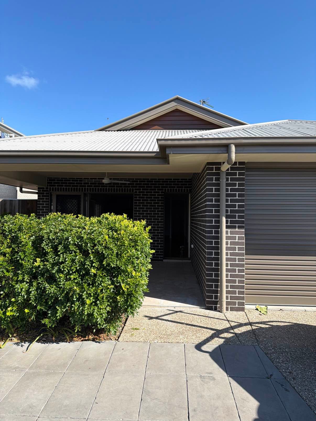 Gutter spout repair for commercial roof drainage in Hervey Bay