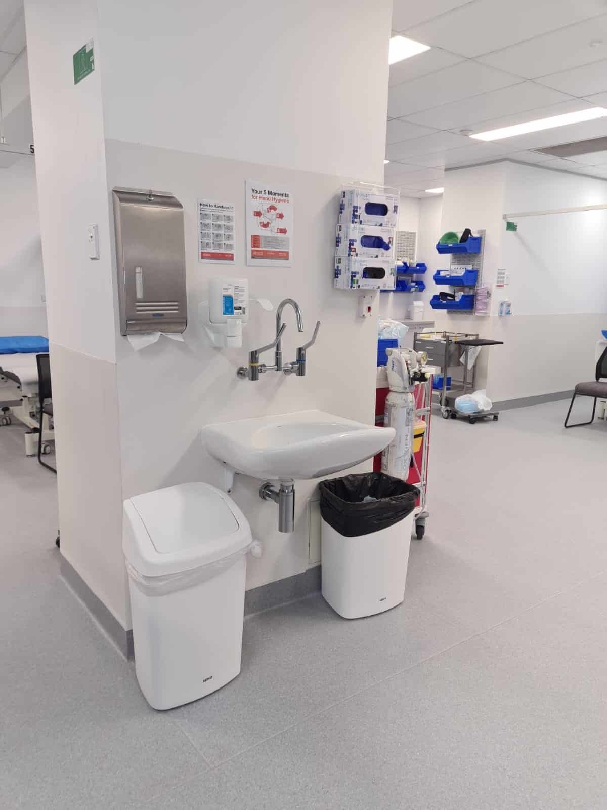 Commercial handwashing station installed in a healthcare treatment area